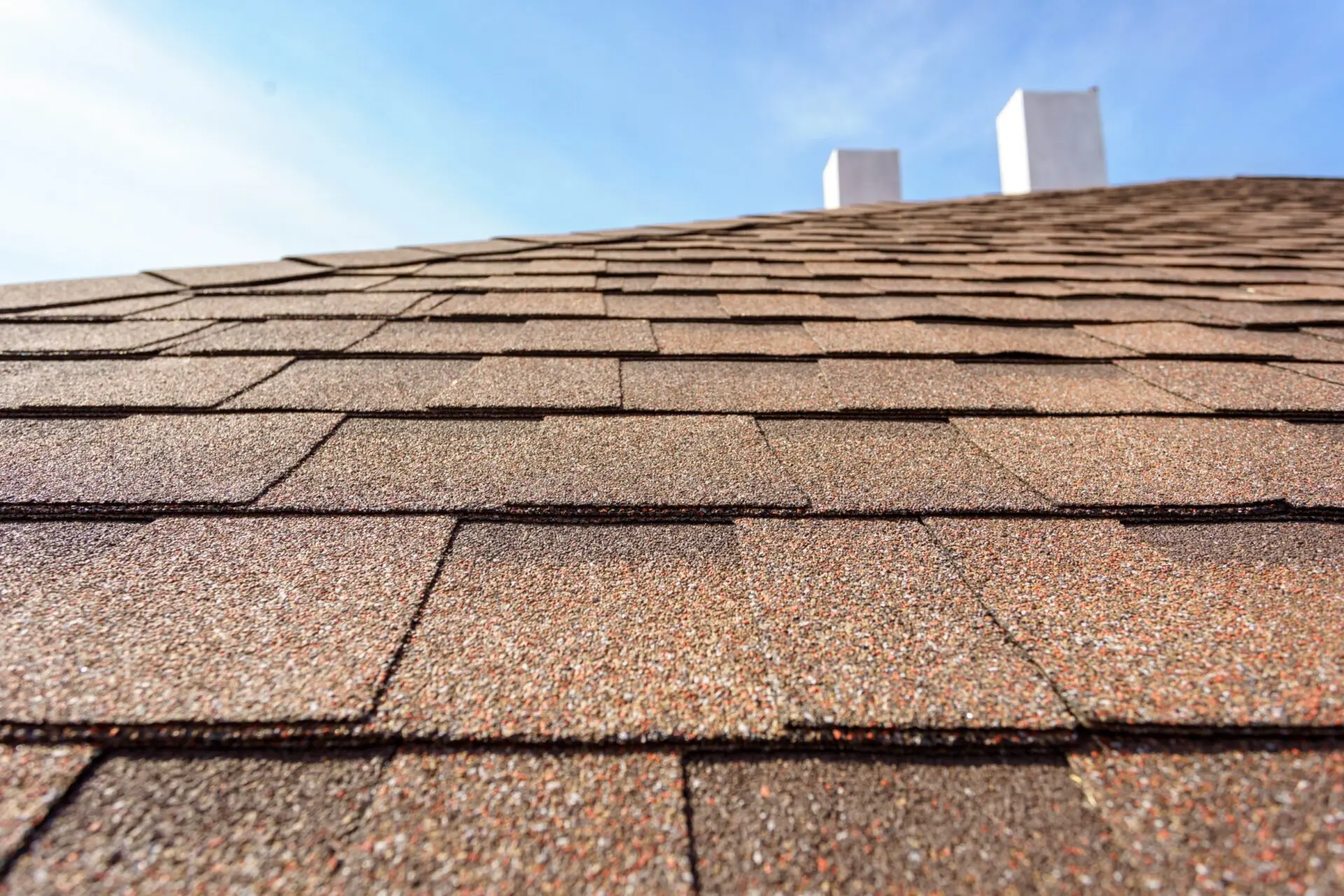 Asphalt shingles on roof top